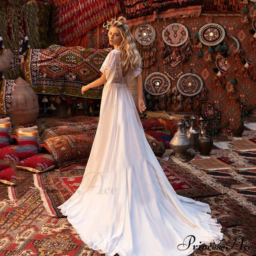 Brief Sleeve Profound Plunge Transparent Bridal Gown - Image 2