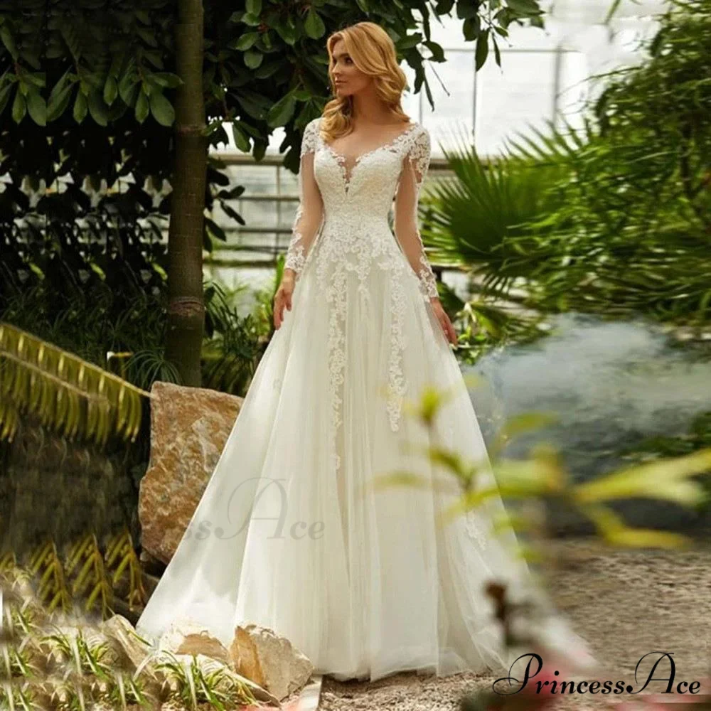 Deep Neck Extended Sleeve Transparent Wedding Gown - Image 3