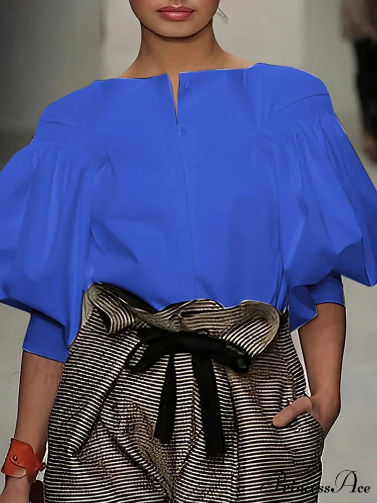 Lantern Quarter Sleeve Button Round Neck Blouse

Modified Title: Lantern One-fourth Sleeve Button Circular Neck Blouse - Image 2