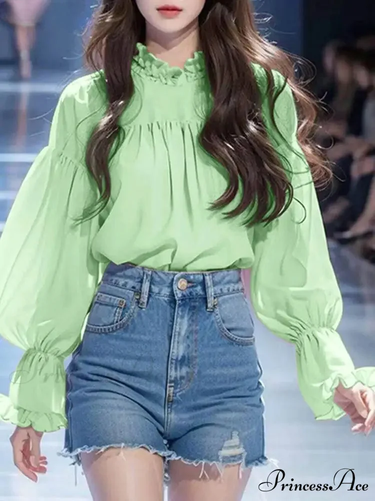 Lantern Sleeve Solid Stand Collar Blouse

Modified Title: Lantern Sleeve Monochrome High Neck Blouse - Image 3