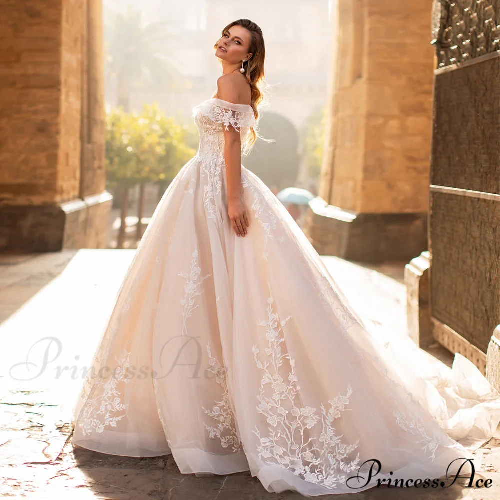 Off-Shoulder Celestial Long Train Wedding Gown - Image 4