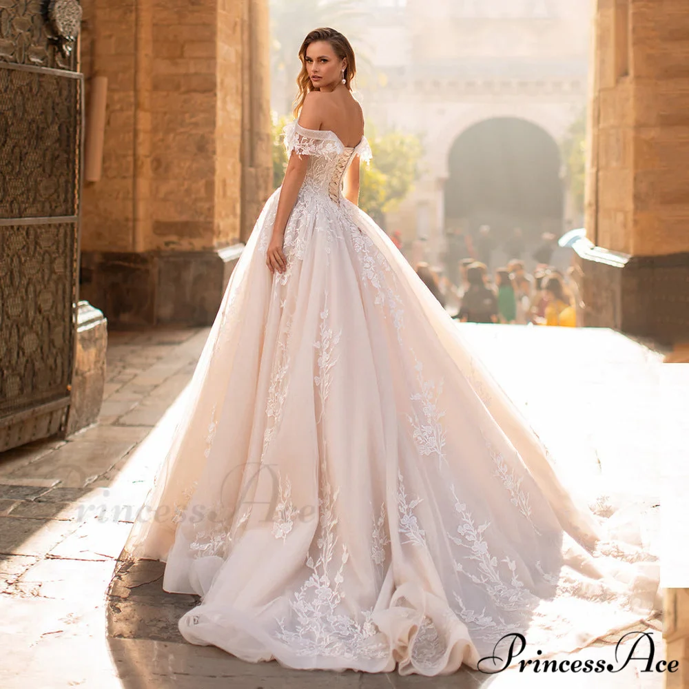 Off-Shoulder Celestial Long Train Wedding Gown - Image 6