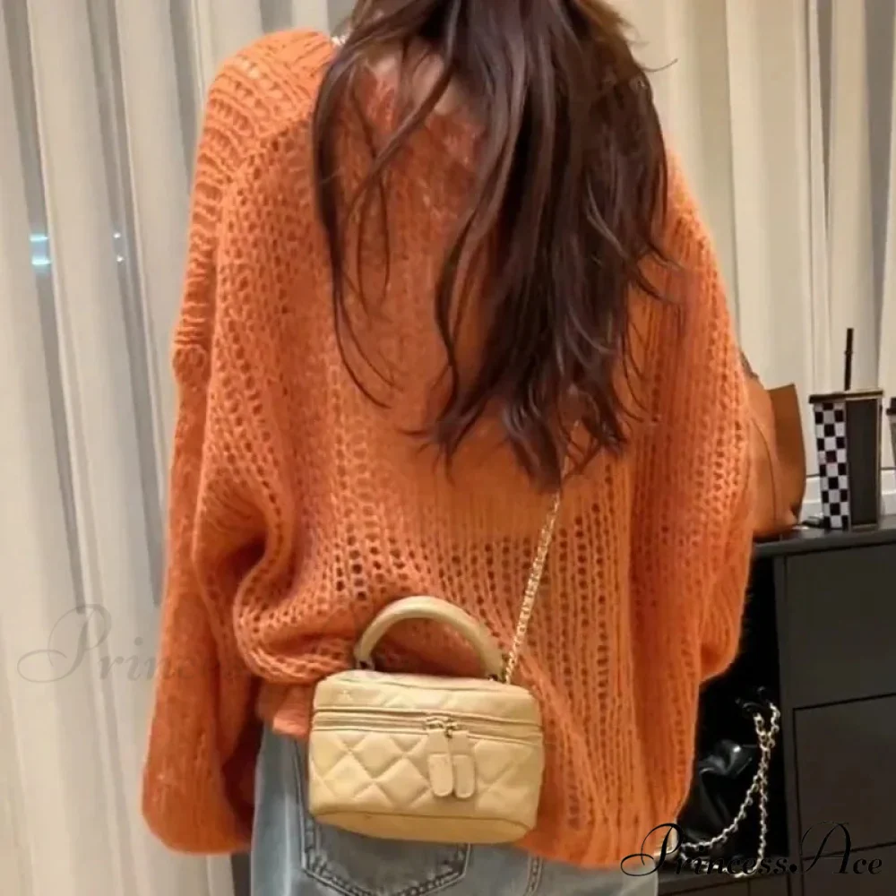 Orange Lantern Sleeve Open Stitch Loose Spring Cardigan
Modified: Orange Lantern Sleeve Open Stitch Baggy Spring Cardigan - Image 2
