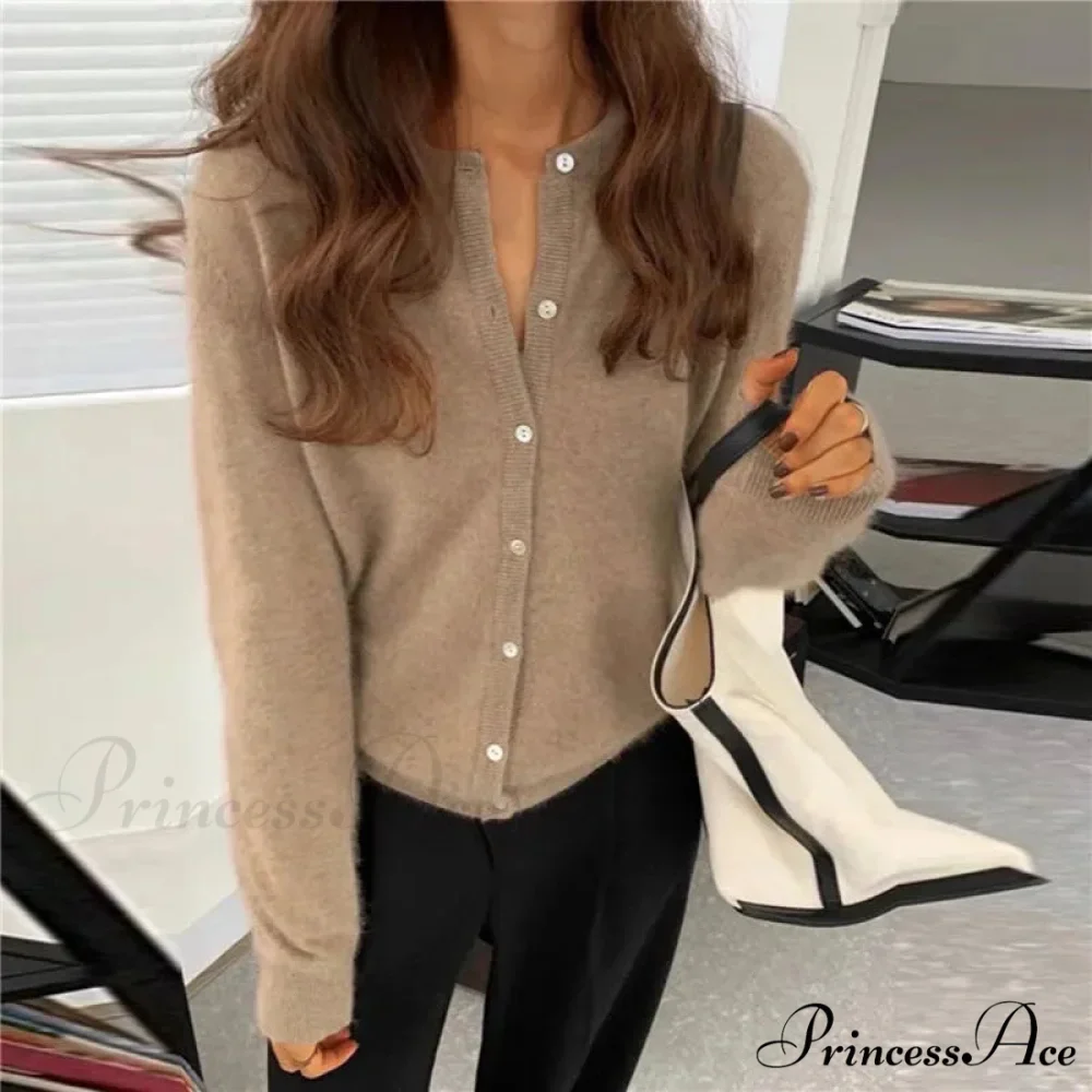 Single Breasted Solid Round Neck Knitted Cardigan

Modified Title: One Buttoned Plain Circular Neck Knitted Cardigan - Image 11