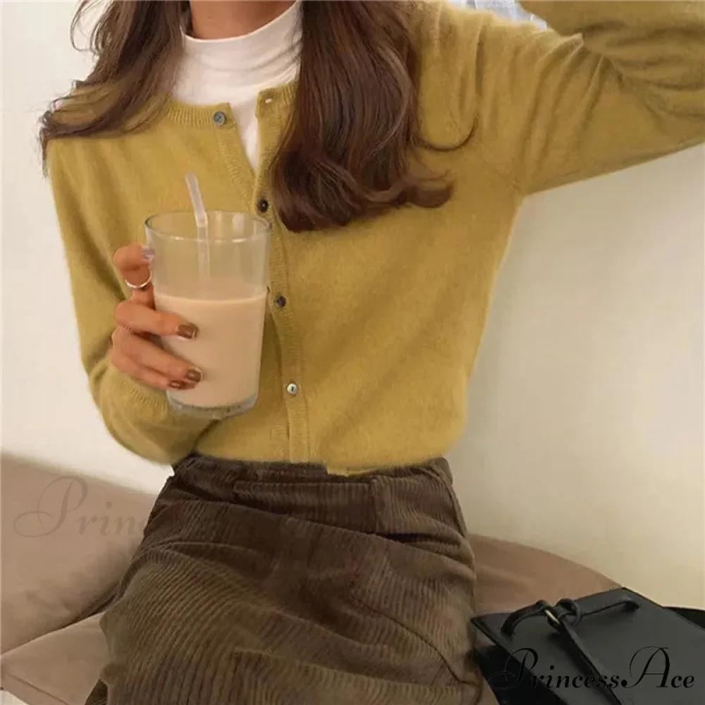 Single Breasted Solid Round Neck Knitted Cardigan

Modified Title: One Buttoned Plain Circular Neck Knitted Cardigan - Image 12