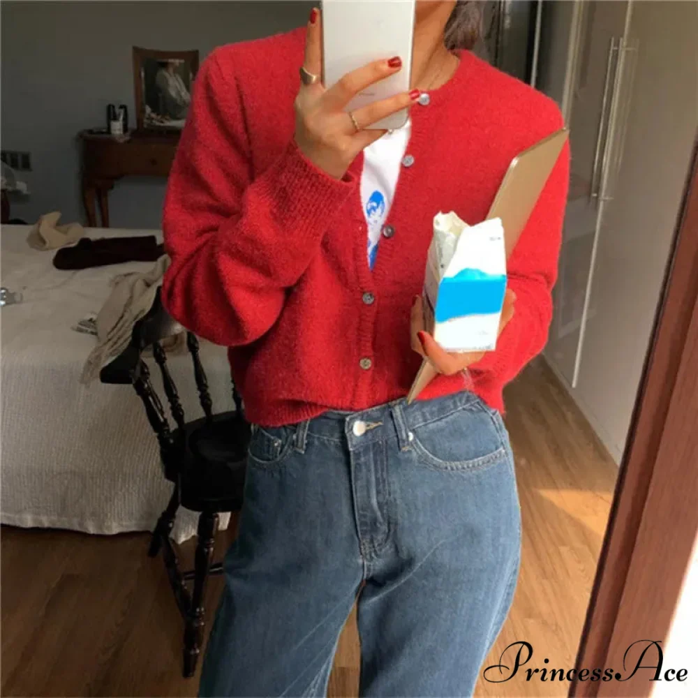 Single Breasted Solid Round Neck Knitted Cardigan

Modified Title: One Buttoned Plain Circular Neck Knitted Cardigan - Image 14