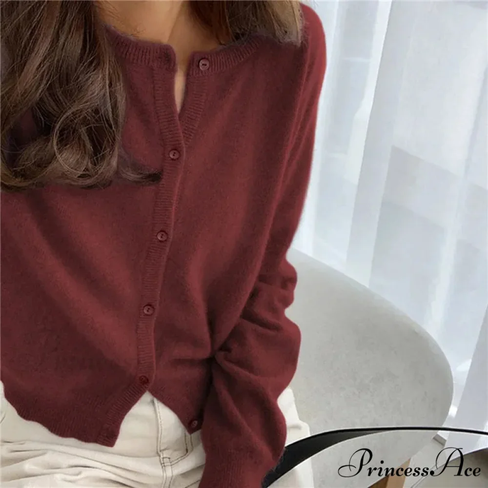 Single Breasted Solid Round Neck Knitted Cardigan

Modified Title: One Buttoned Plain Circular Neck Knitted Cardigan - Image 5