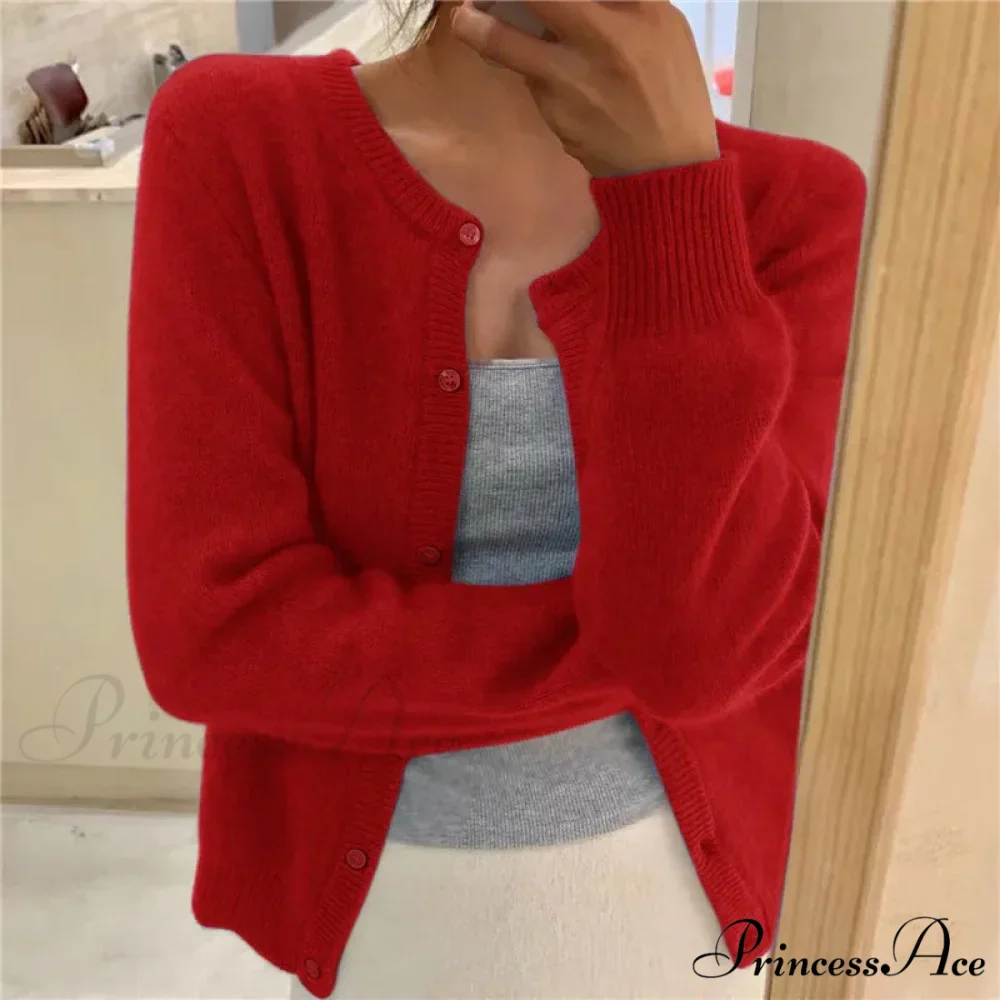 Single Breasted Solid Round Neck Knitted Cardigan

Modified Title: One Buttoned Plain Circular Neck Knitted Cardigan - Image 6