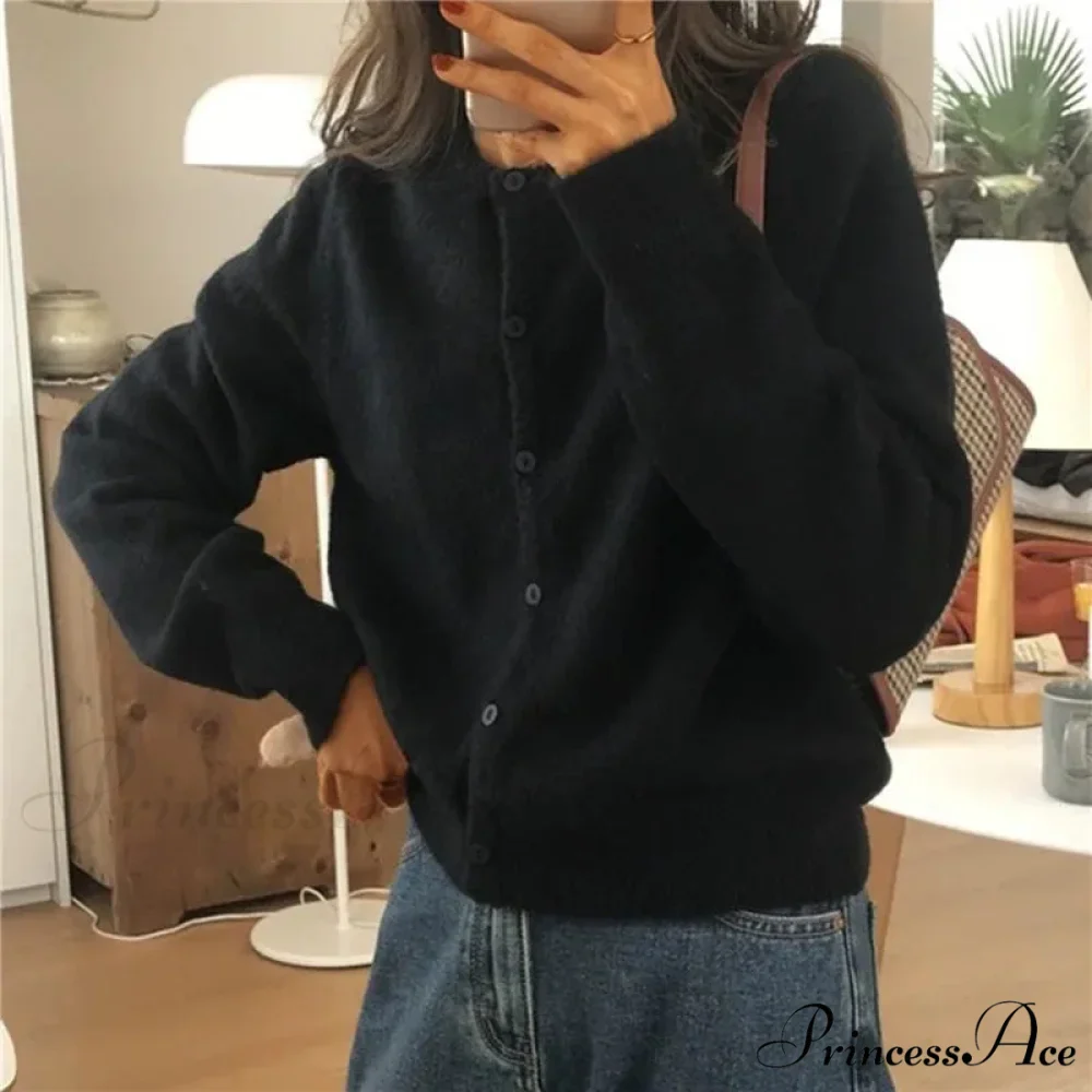 Single Breasted Solid Round Neck Knitted Cardigan

Modified Title: One Buttoned Plain Circular Neck Knitted Cardigan - Image 7
