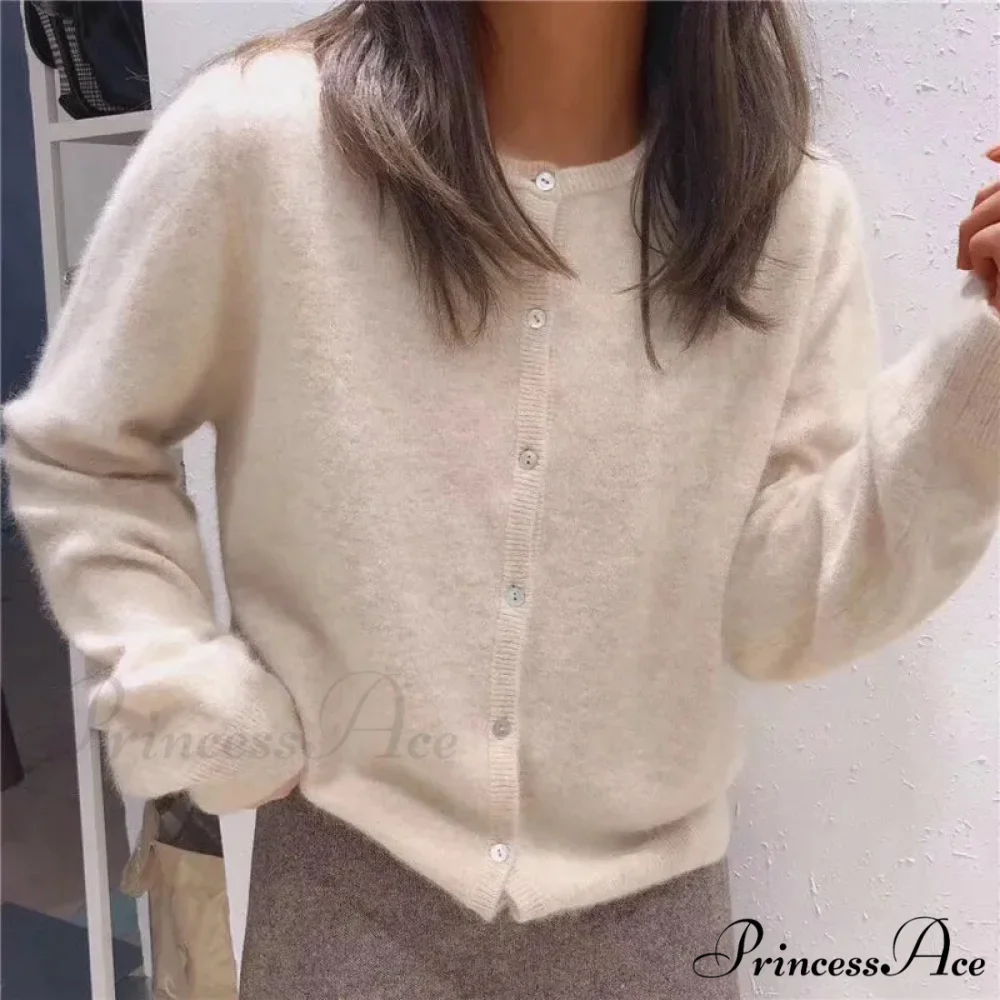 Single Breasted Solid Round Neck Knitted Cardigan

Modified Title: One Buttoned Plain Circular Neck Knitted Cardigan - Image 8