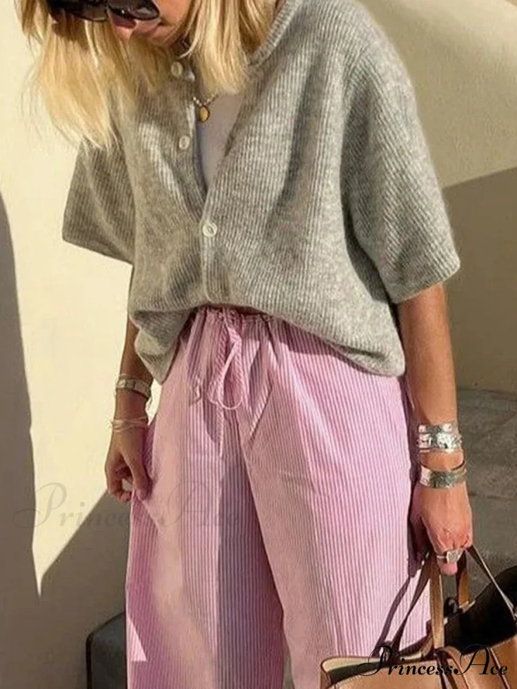 Sleeveless Circular Neck Button-Up Cardigan - Image 4