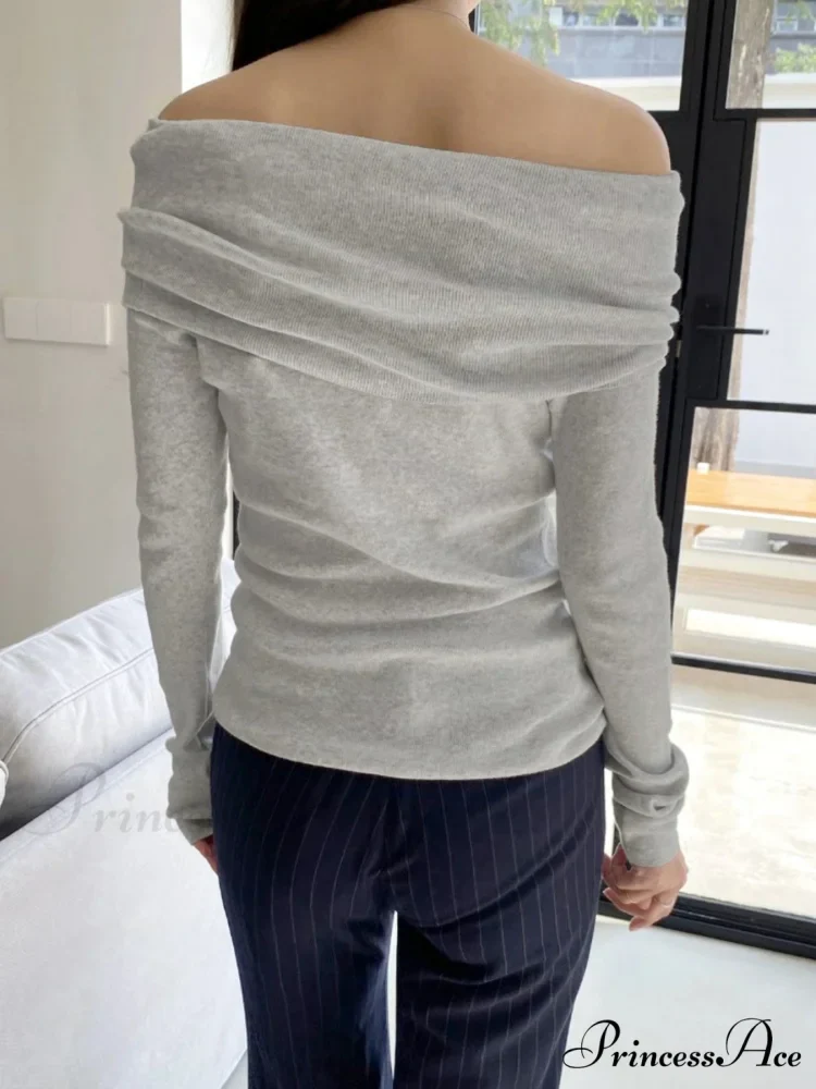 Slender Off-Shoulder Monochrome Slash Neck Extended Sleeve Knit Top - Image 3