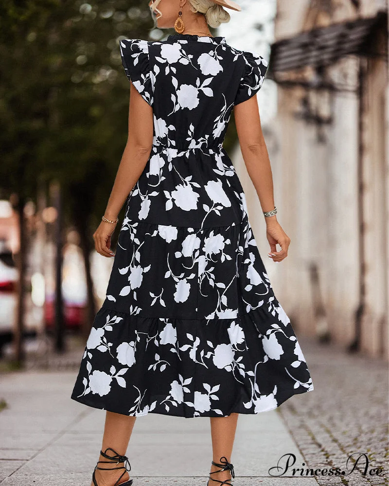 Floral dress with ruffled sleeves - Image 2