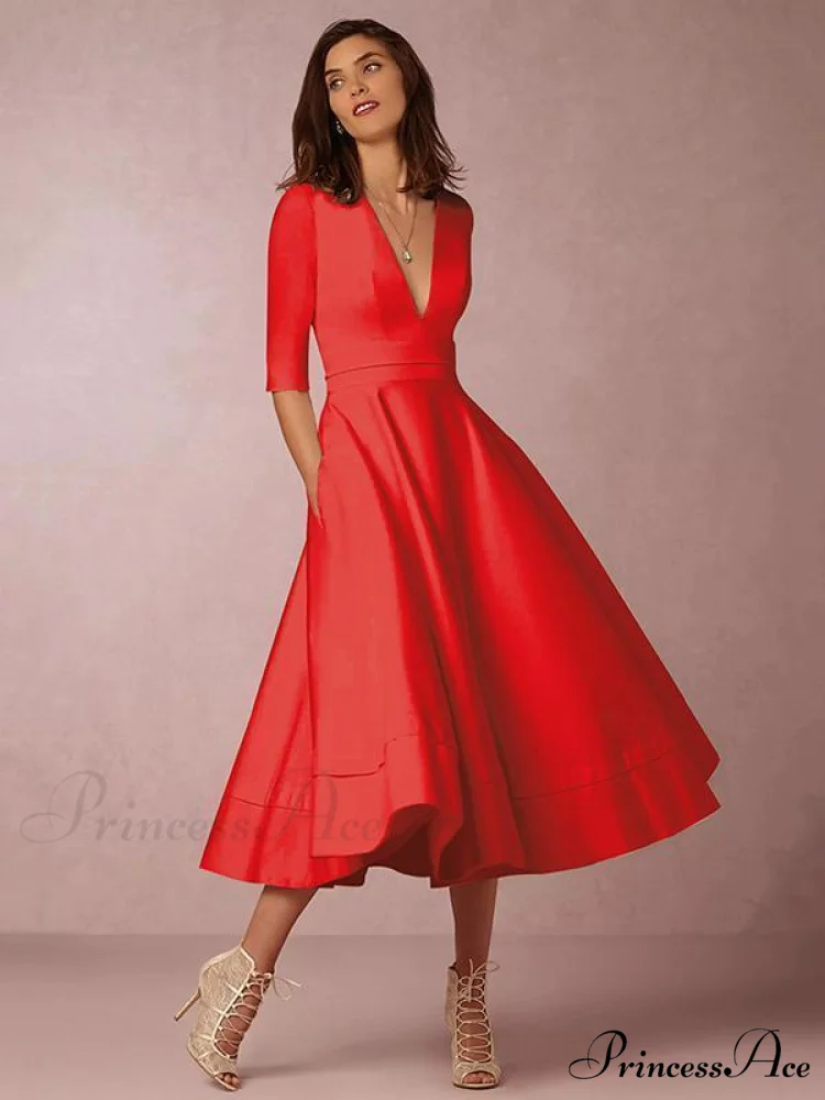 Elegant White V-neck Evening Dress with Half Sleeves - Image 2