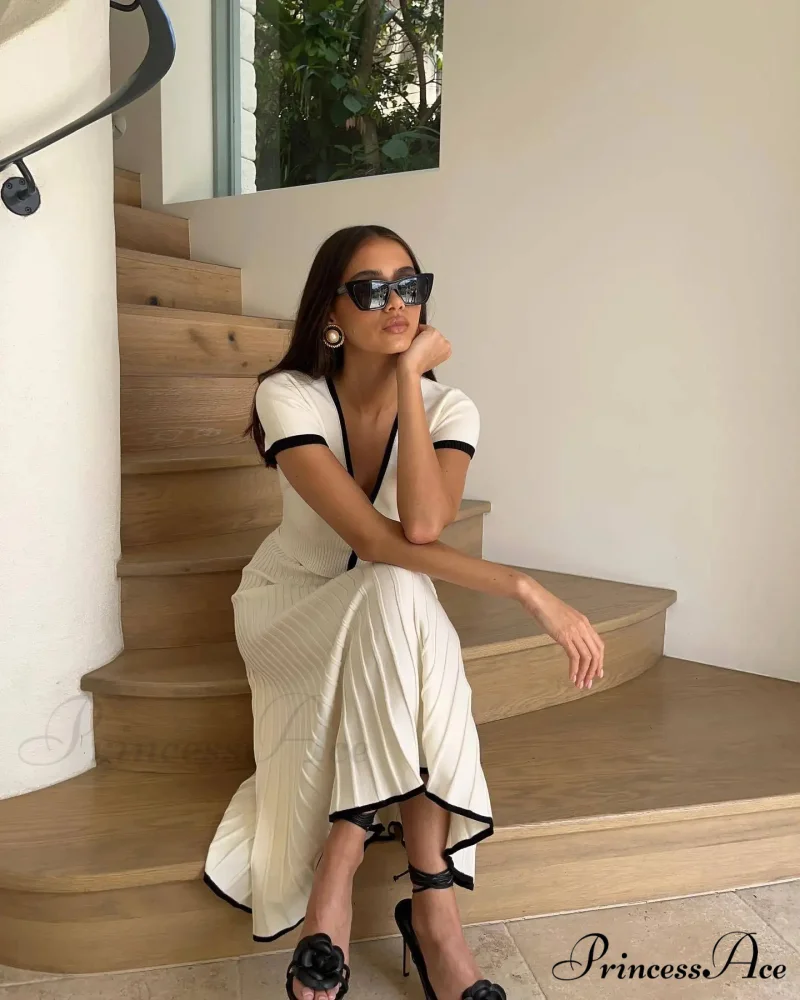 Knit Two Tone Short Sleeve Buttoned Modern Top And Pleated Midi Skirt Set - Image 12