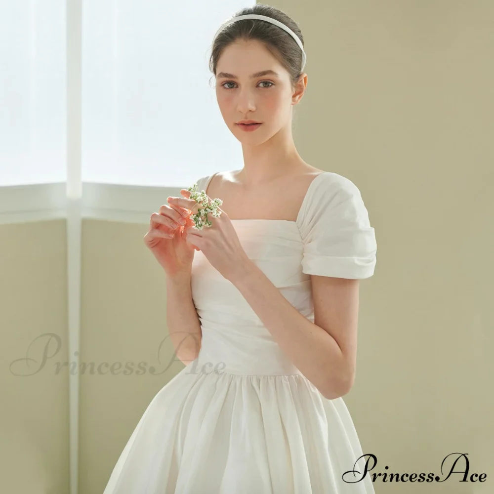 Vintage Wedding Gown with Off-the-Shoulder Design - Image 3