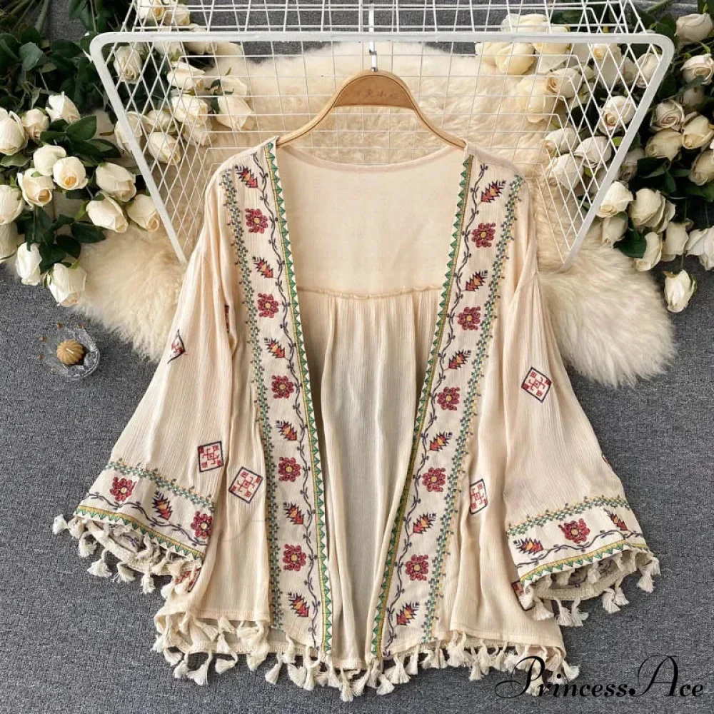 White Cotton Rayon Floral Embroidery Beach Cover up

Modified Title: Ivory Cotton Rayon Botanical Stitching Beach Cover up - Image 4